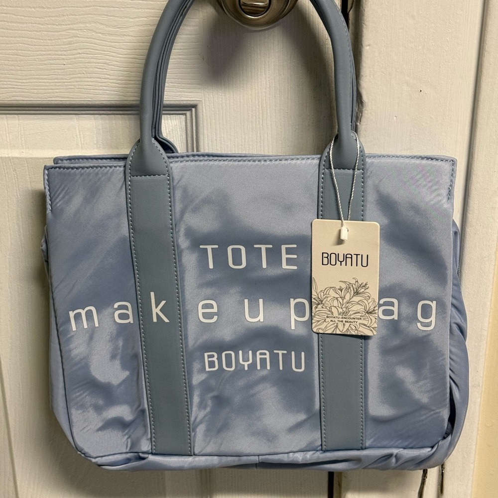 Light Blue Tote Bag with Sturdy Handles and Simple Design
